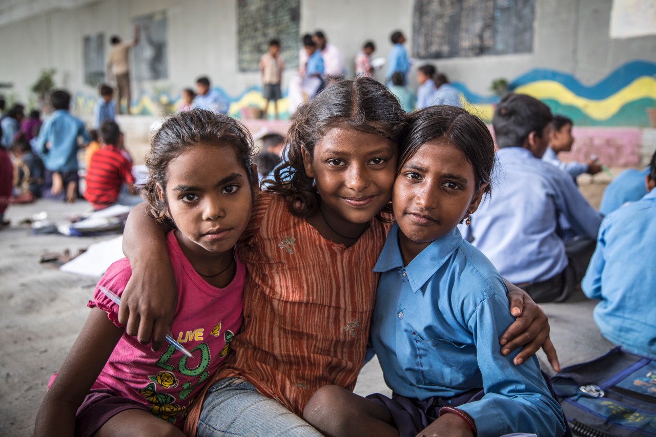 Students of the Free School, Babita (left), Shivani Kumari (centre) and Priyanka Kumari (right) pose for a  photograph.